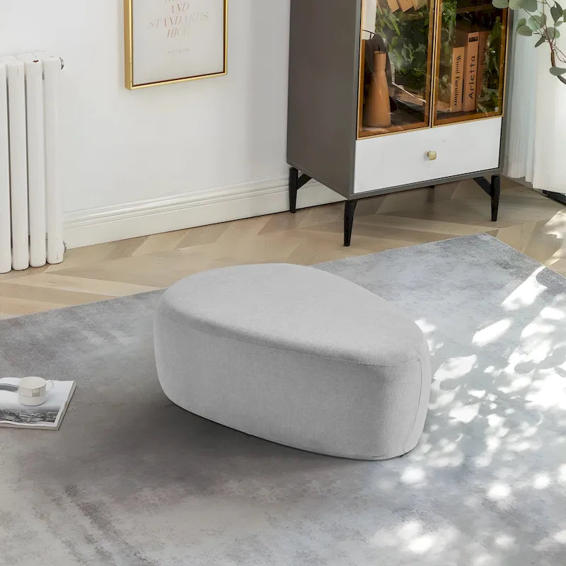 Pouf d'appoint triangulaire capitonné moderne