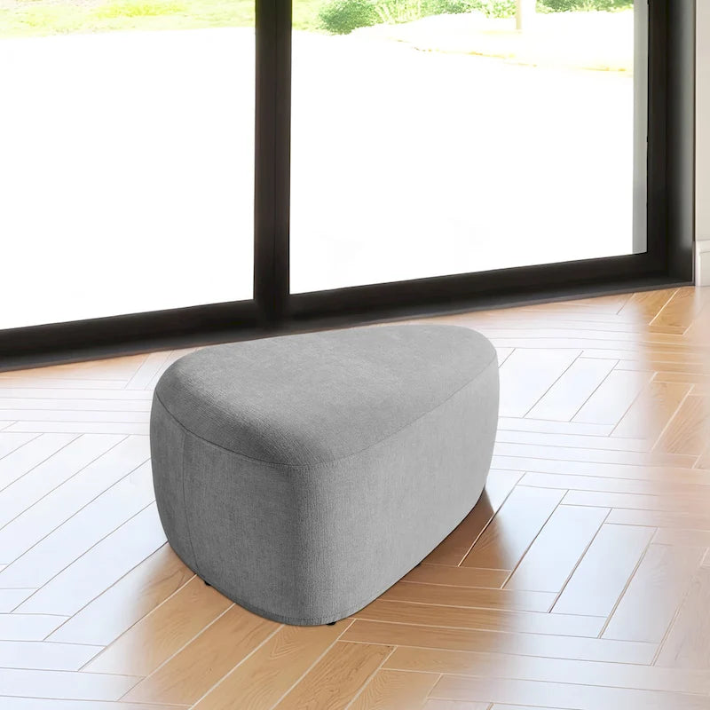 Pouf d'appoint triangulaire capitonné moderne