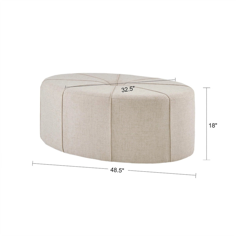 Pouf capitonné ovale surdimensionné
