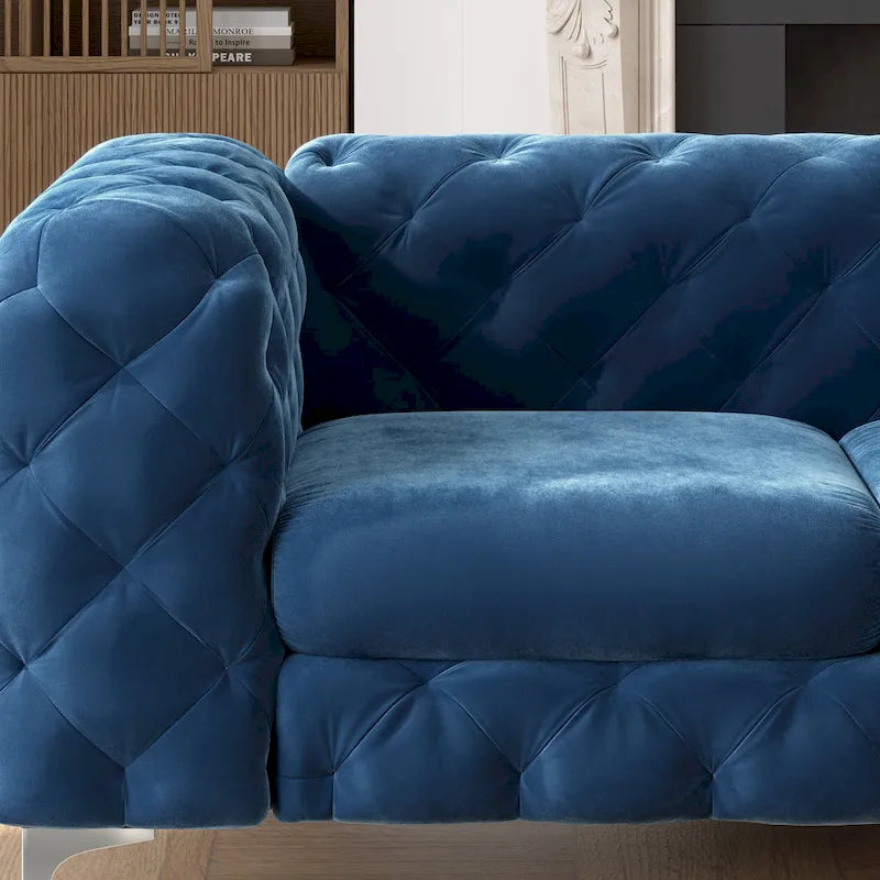 Causeuse chesterfield en velours capitonné