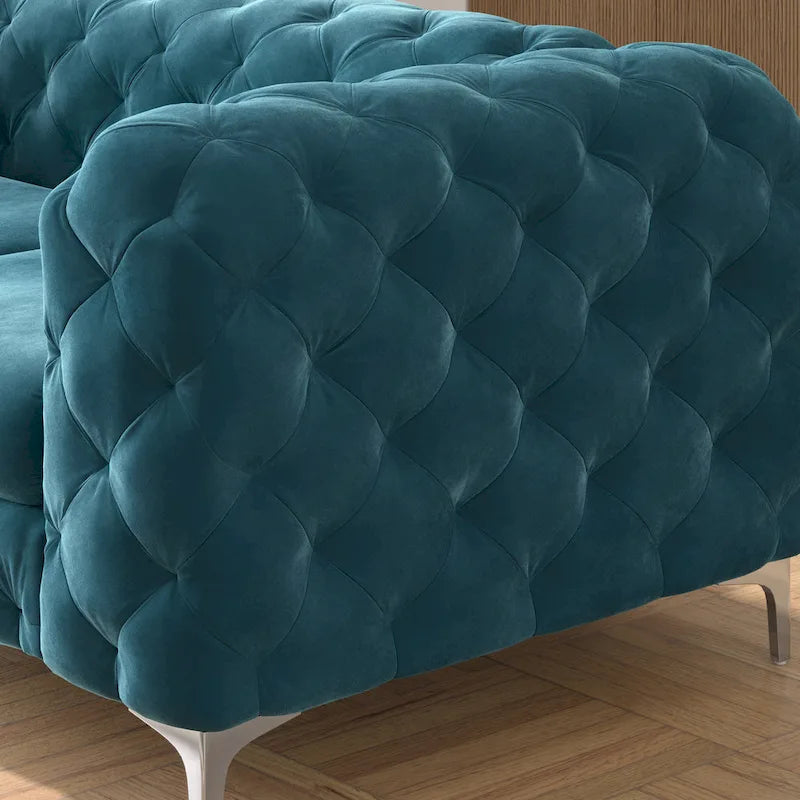 Causeuse chesterfield en velours capitonné