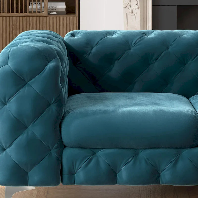 Causeuse chesterfield en velours capitonné
