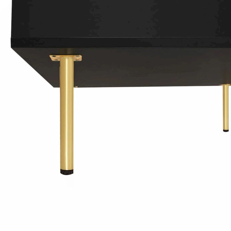 Table basse exquise laquée à pieds dorés